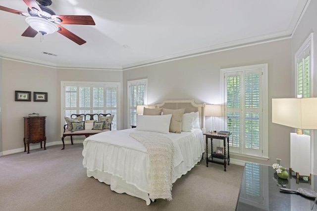 1908 Columbine Dr, Lufkin, TX 75904 - carpeted bedroom featuring multiple windows, crown molding, and a ceiling fan