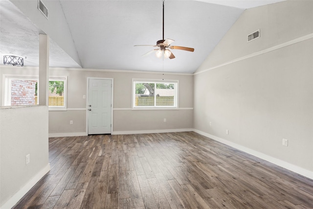 5000 Old Castle Ln, Dickinson, TX 77539 - empty room with hardwood / wood-style floors, ceiling fan, lofted ceiling, and baseboards