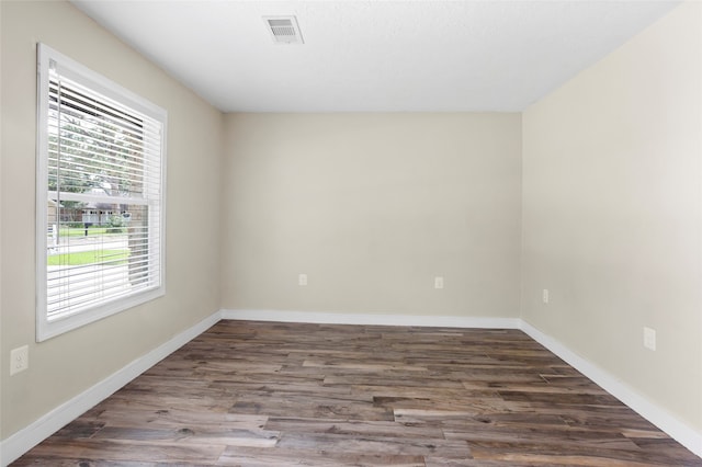 5000 Old Castle Ln, Dickinson, TX 77539 - spare room with wood finished floors and baseboards