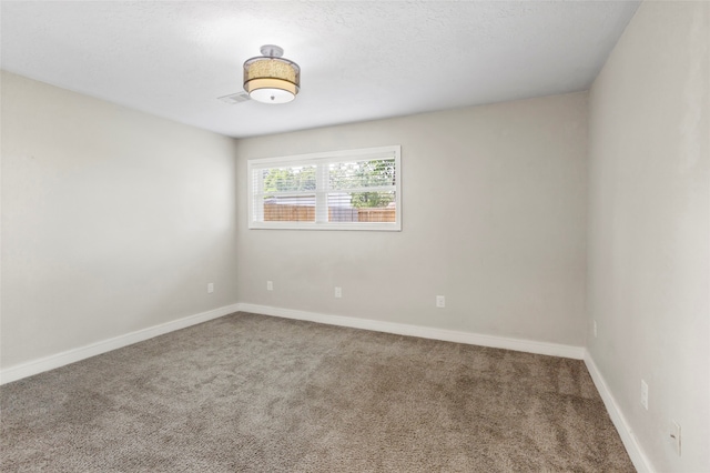 5000 Old Castle Ln, Dickinson, TX 77539 - spare room featuring carpet floors and baseboards