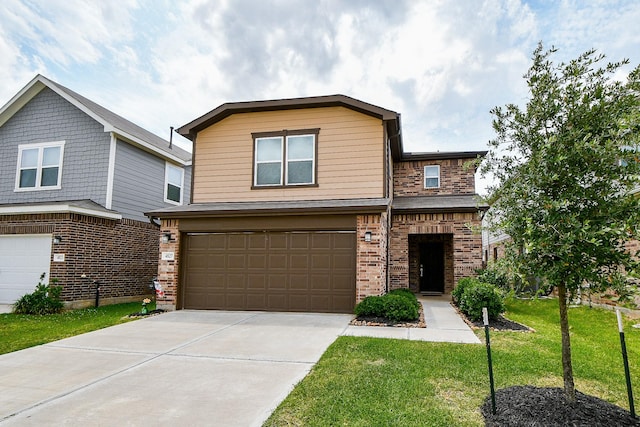 4827 Ranleagh Ct, Katy, TX 77493 - view of front of property with brick siding, a front yard, a garage, and concrete driveway