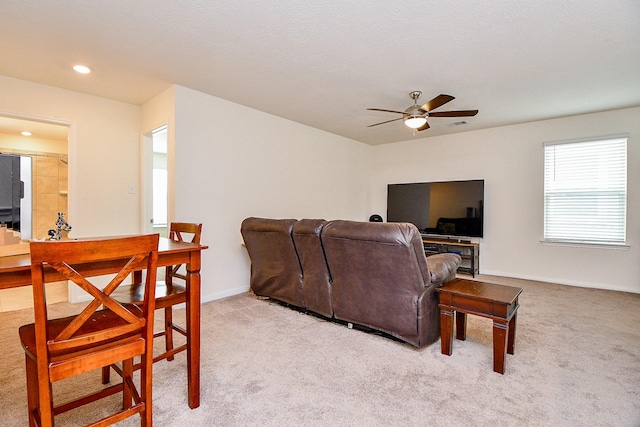 4827 Ranleagh Ct, Katy, TX 77493 - living area featuring ceiling fan, light carpet, baseboards, and recessed lighting