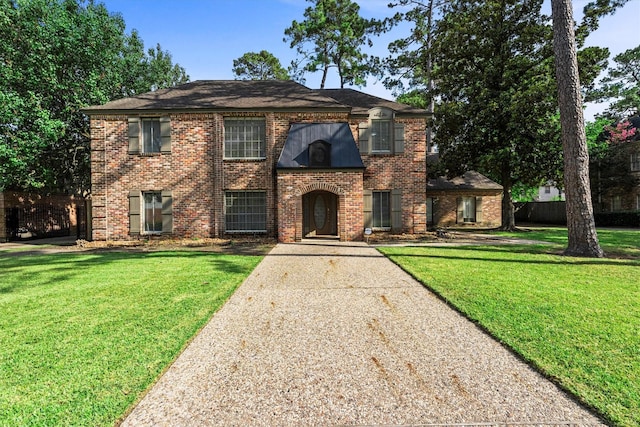 5523 Theall Rd, Houston, TX 77066 - view of front facade featuring brick siding and driveway