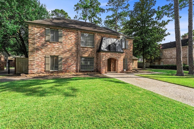 5523 Theall Rd, Houston, TX 77066 - view of front of property with a front yard and brick siding