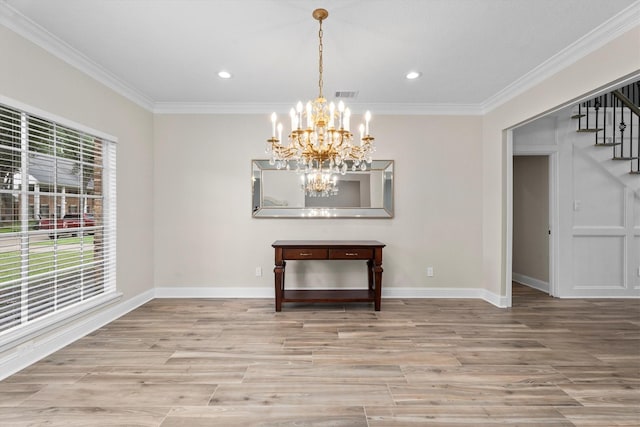 5523 Theall Rd, Houston, TX 77066 - unfurnished dining area with stairs, ornamental molding, baseboards, a chandelier, and wood finished floors