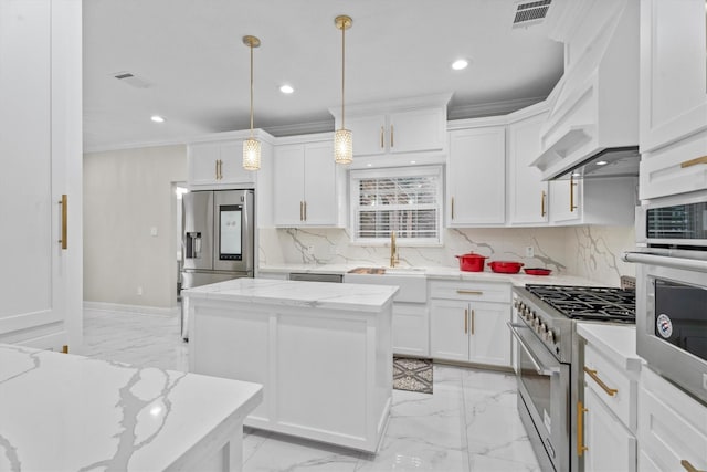 5523 Theall Rd, Houston, TX 77066 - kitchen with stainless steel appliances, a sink, light marble finish floors, a kitchen island, and recessed lighting