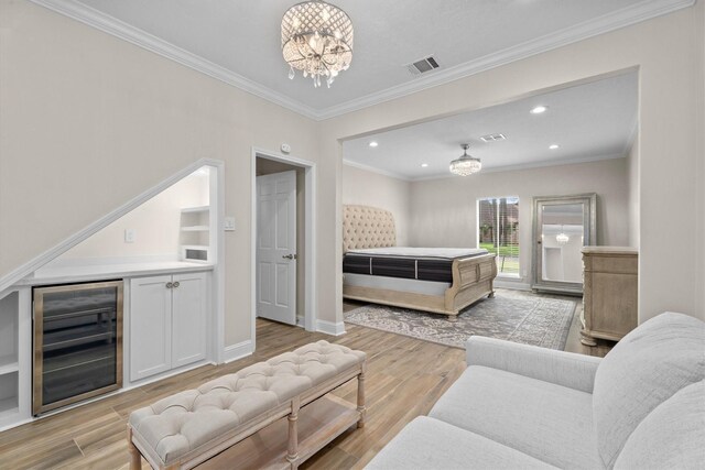 5523 Theall Rd, Houston, TX 77066 - bedroom featuring wine cooler, a chandelier, light wood finished floors, access to outside, and recessed lighting