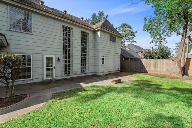 5523 Theall Rd, Houston, TX 77066 - rear view of house with a patio area