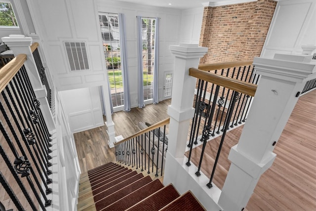 5523 Theall Rd, Houston, TX 77066 - entryway featuring a decorative wall and wood finished floors