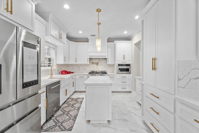 5523 Theall Rd, Houston, TX 77066 - kitchen with stainless steel appliances, a sink, a kitchen island, white cabinetry, and recessed lighting