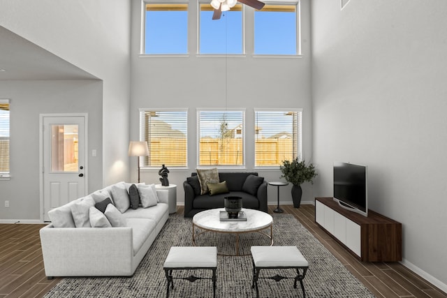 32415 Tallow Creek Dr, Waller, TX 77484 - living room featuring wood finish floors, a ceiling fan, plenty of natural light, and a towering ceiling