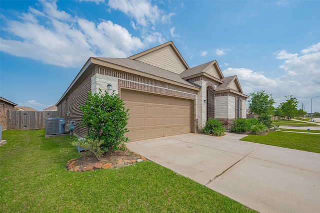 15602 Clearwater Bend Dr, Houston, TX 77044 - view of front of property featuring brick siding, central AC, an attached garage, and concrete driveway