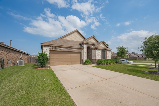 15602 Clearwater Bend Dr, Houston, TX 77044 - ranch-style home with brick siding, central air condition unit, an attached garage, driveway, and a front lawn