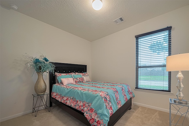 15602 Clearwater Bend Dr, Houston, TX 77044 - carpeted bedroom with baseboards and a textured ceiling