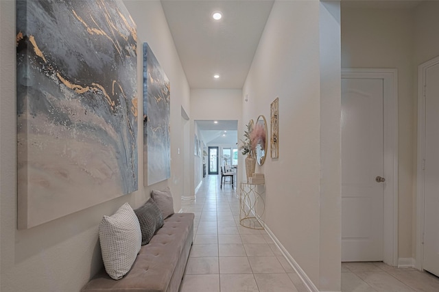 15602 Clearwater Bend Dr, Houston, TX 77044 - hall featuring light tile patterned floors, recessed lighting, and baseboards