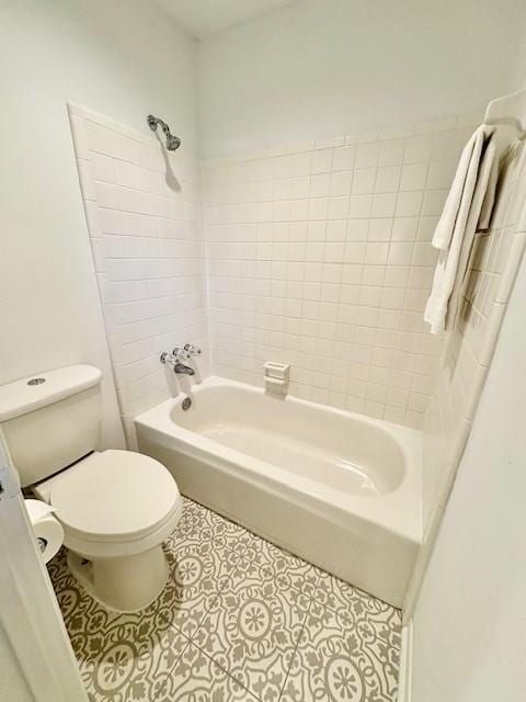 18526 Denise Dale Ln, Houston, TX 77084 - bathroom with toilet, tile patterned floors, and washtub / shower combination