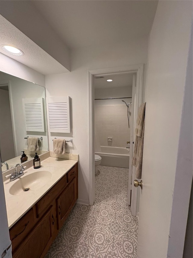 18526 Denise Dale Ln, Houston, TX 77084 - bathroom with vanity, toilet, shower / bath combination, recessed lighting, and baseboards