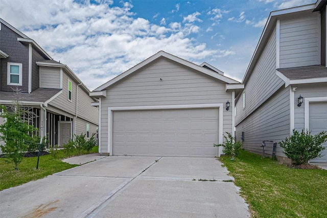 24710 Landolfi Dr, Katy, TX 77493 - view of front facade featuring a garage and concrete driveway