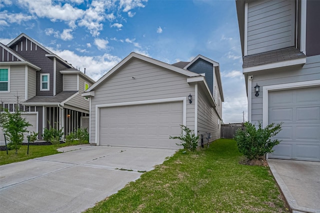 24710 Landolfi Dr, Katy, TX 77493 - view of front of home with a garage, a front lawn, and concrete driveway