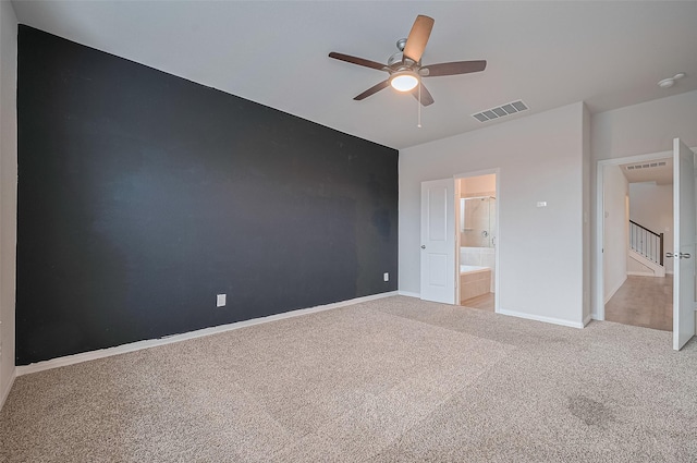 24710 Landolfi Dr, Katy, TX 77493 - unfurnished bedroom with light carpet, baseboards, ensuite bath, and a ceiling fan