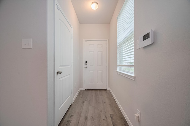 24710 Landolfi Dr, Katy, TX 77493 - hall featuring baseboards and light wood finished floors