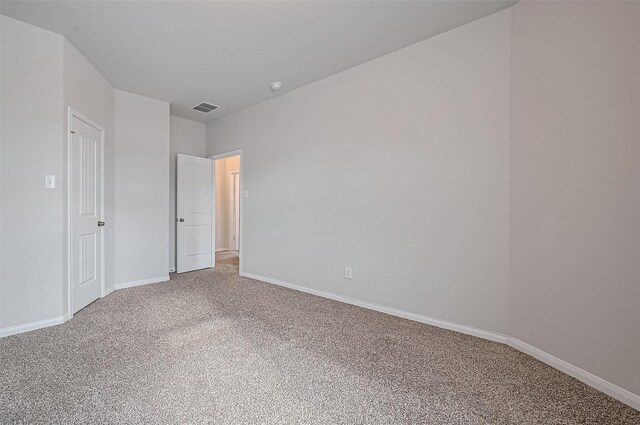 24710 Landolfi Dr, Katy, TX 77493 - unfurnished bedroom with light colored carpet and baseboards