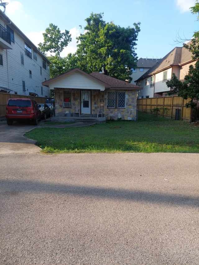 5114 Eigel St, Houston, TX 77007 - bungalow-style house featuring stone siding, a porch, and driveway
