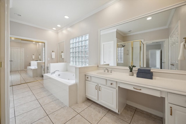 5405 Blossom St, Houston, TX 77007 - bathroom with a garden tub, a stall shower, vanity, tile patterned floors, and ornamental molding