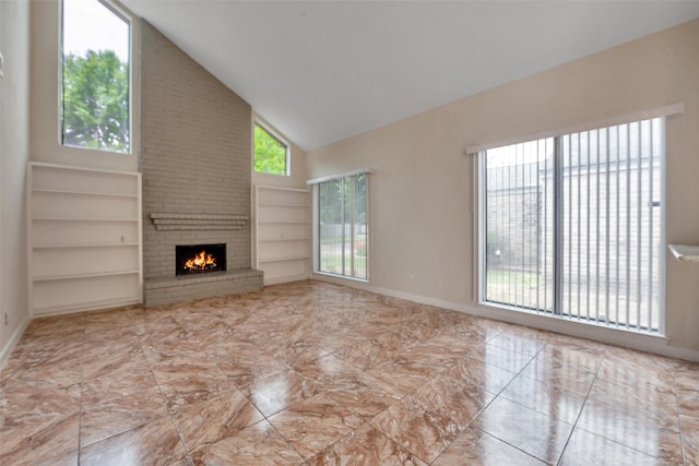 4111 Wildacres Dr, Houston, TX 77072 - unfurnished living room with high vaulted ceiling, a brick fireplace, and built in shelves