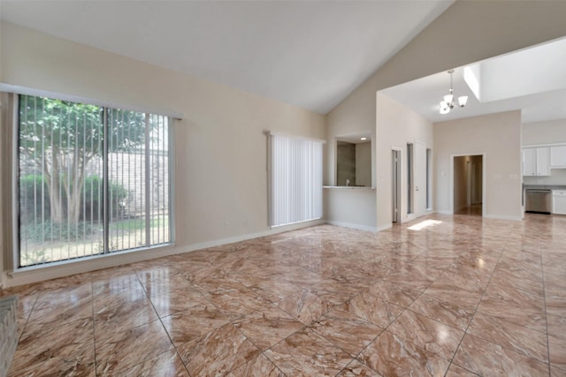 4111 Wildacres Dr, Houston, TX 77072 - spare room featuring light marble finish floors, a chandelier, and high vaulted ceiling