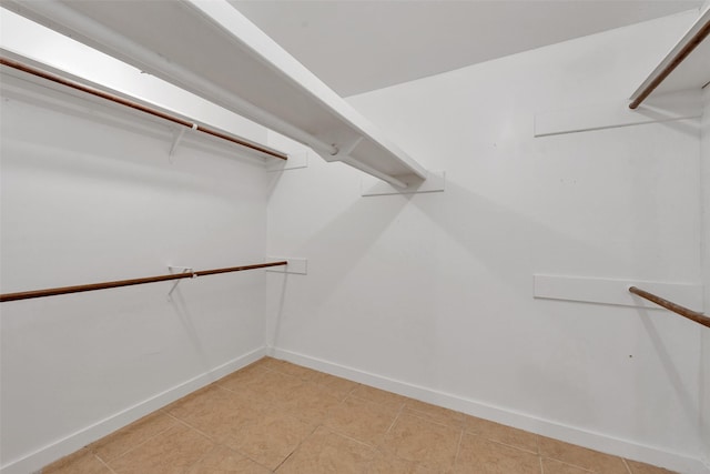 4111 Wildacres Dr, Houston, TX 77072 - walk in closet featuring light tile patterned floors