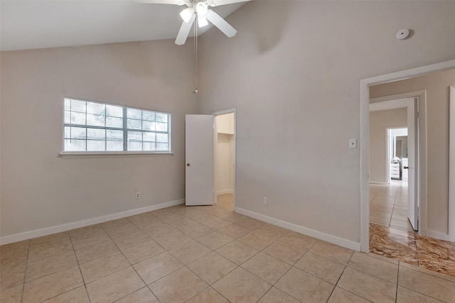4111 Wildacres Dr, Houston, TX 77072 - unfurnished room with ceiling fan, high vaulted ceiling, light tile patterned floors, baseboards, and a smoke detector