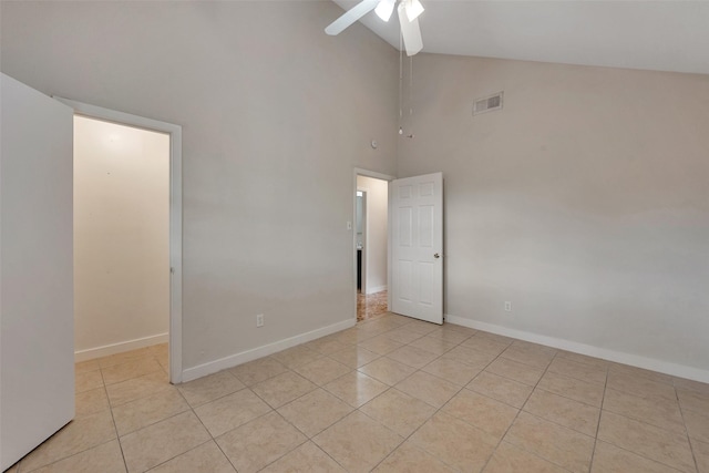 4111 Wildacres Dr, Houston, TX 77072 - spare room with light tile patterned floors, high vaulted ceiling, and ceiling fan