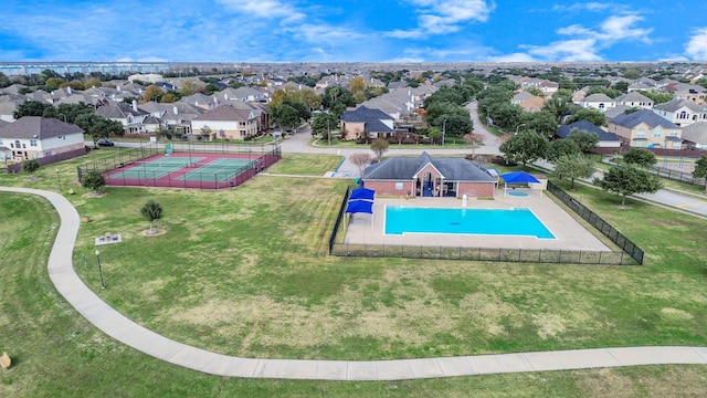 aerial view of residential area featuring a pool area