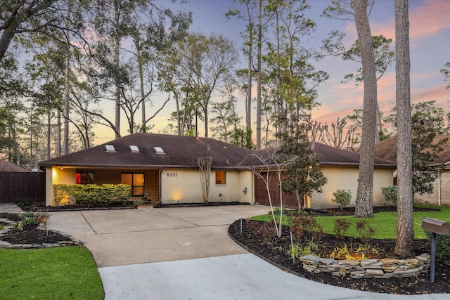 8332 Cedarspur Dr, Spring Valley Village, TX 77055 - view of front of house with concrete driveway, brick siding, and an attached garage
