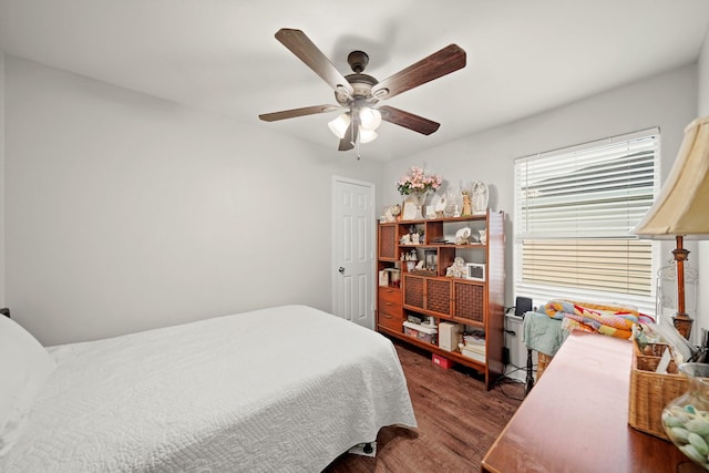 4603 Poppy Crest Ct, Richmond, TX 77469 - bedroom featuring wood finished floors and ceiling fan