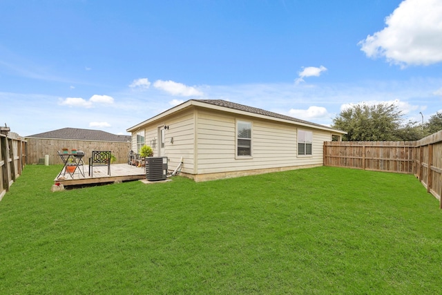 4603 Poppy Crest Ct, Richmond, TX 77469 - rear view of house featuring cooling unit and a deck