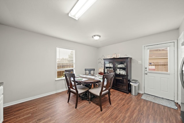 4603 Poppy Crest Ct, Richmond, TX 77469 - dining space with wood finished floors and baseboards