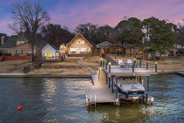 175 Autumn Wood Trl, Gun Barrel City, TX 75156 - dock featuring boat lift and a deck with water view