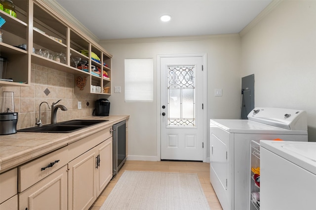 175 Autumn Wood Trl, Gun Barrel City, TX 75156 - laundry area with independent washer and dryer, ornamental molding, electric panel, recessed lighting, and cabinet space