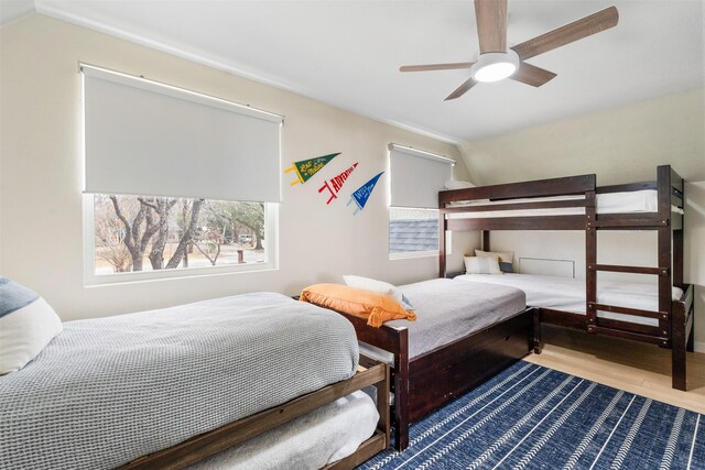 175 Autumn Wood Trl, Gun Barrel City, TX 75156 - bedroom featuring lofted ceiling, wood finished floors, and ceiling fan