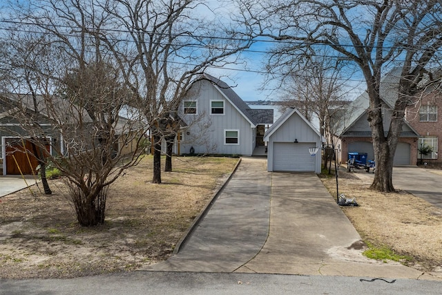 175 Autumn Wood Trl, Gun Barrel City, TX 75156 - view of front of property with board and batten siding, driveway, and a garage