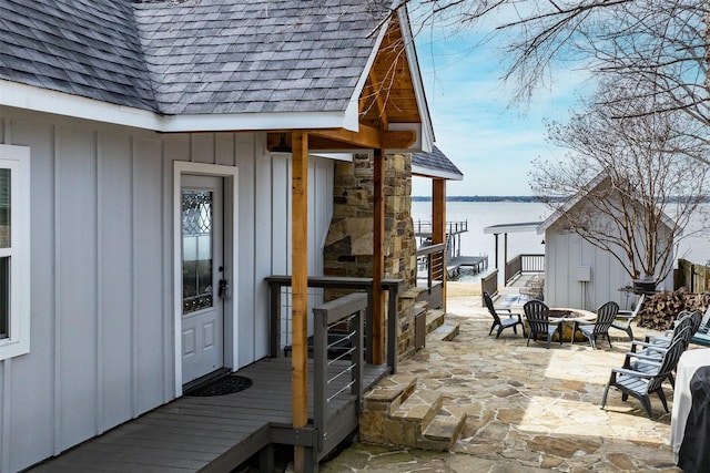175 Autumn Wood Trl, Gun Barrel City, TX 75156 - wooden deck featuring a water view, an outdoor fire pit, and a patio area