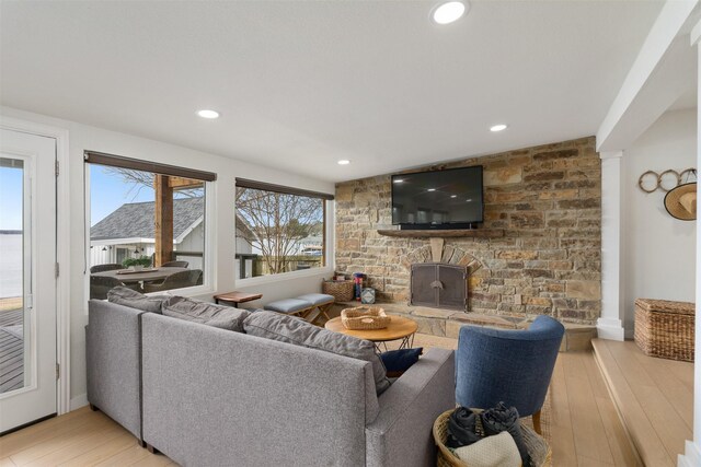 175 Autumn Wood Trl, Gun Barrel City, TX 75156 - living room featuring light wood-style floors, recessed lighting, and a fireplace