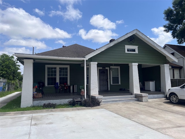 8015 Joplin, Houston, TX 77017 - view of front facade featuring covered porch and brick siding