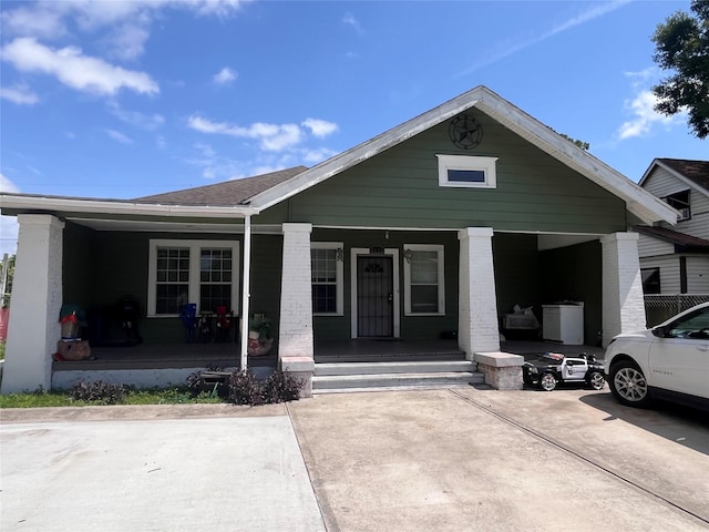 8015 Joplin, Houston, TX 77017 - view of front of home featuring a porch and brick siding