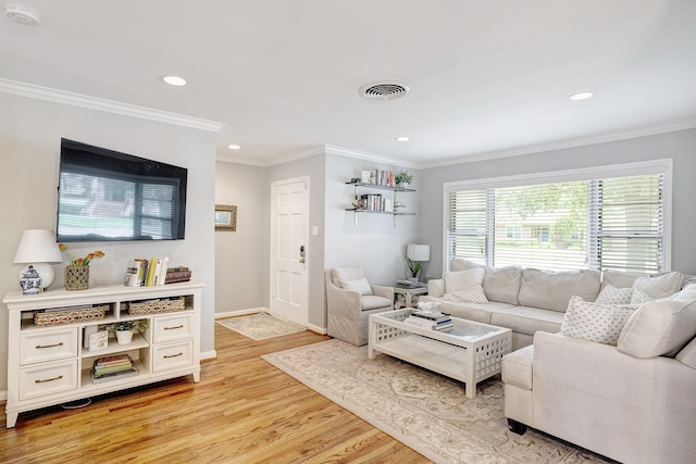 1023 Waltway Dr, Houston, TX 77008 - living area with recessed lighting, light wood-style floors, ornamental molding, and baseboards