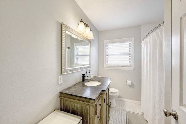 1023 Waltway Dr, Houston, TX 77008 - full bath with toilet, vanity, and baseboards