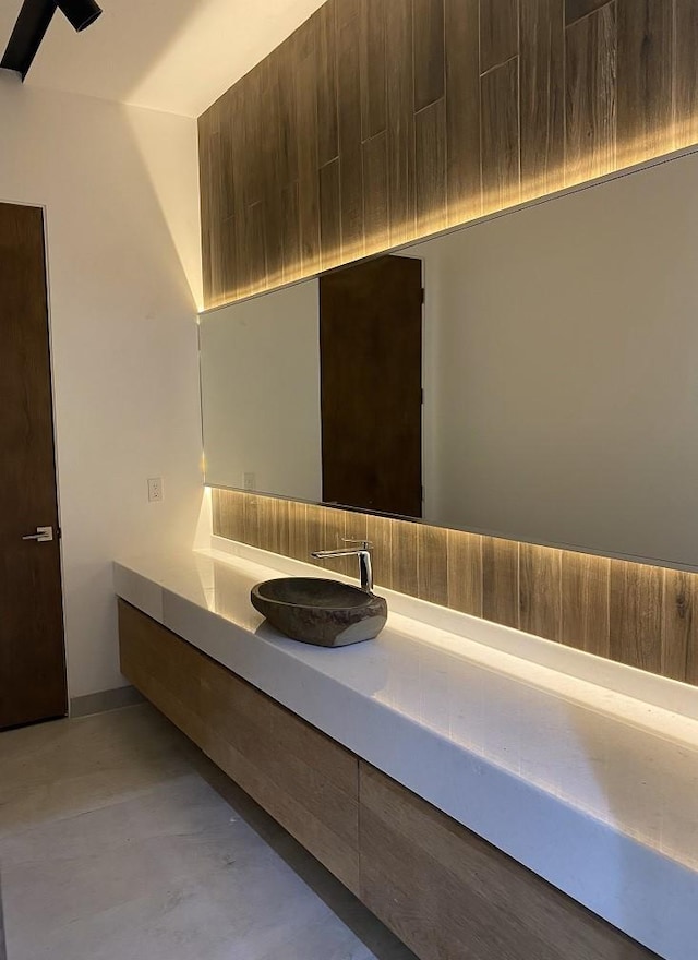 12815 Hansel Ln, Houston, TX 77024 - bathroom with finished concrete floors and vanity