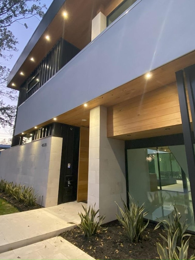12815 Hansel Ln, Houston, TX 77024 - view of exterior entry with concrete block siding